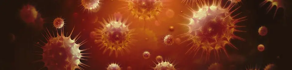 Orange black representation of coronavirus particles in the air, symbolizing the spread and aerosols during the pandemic.